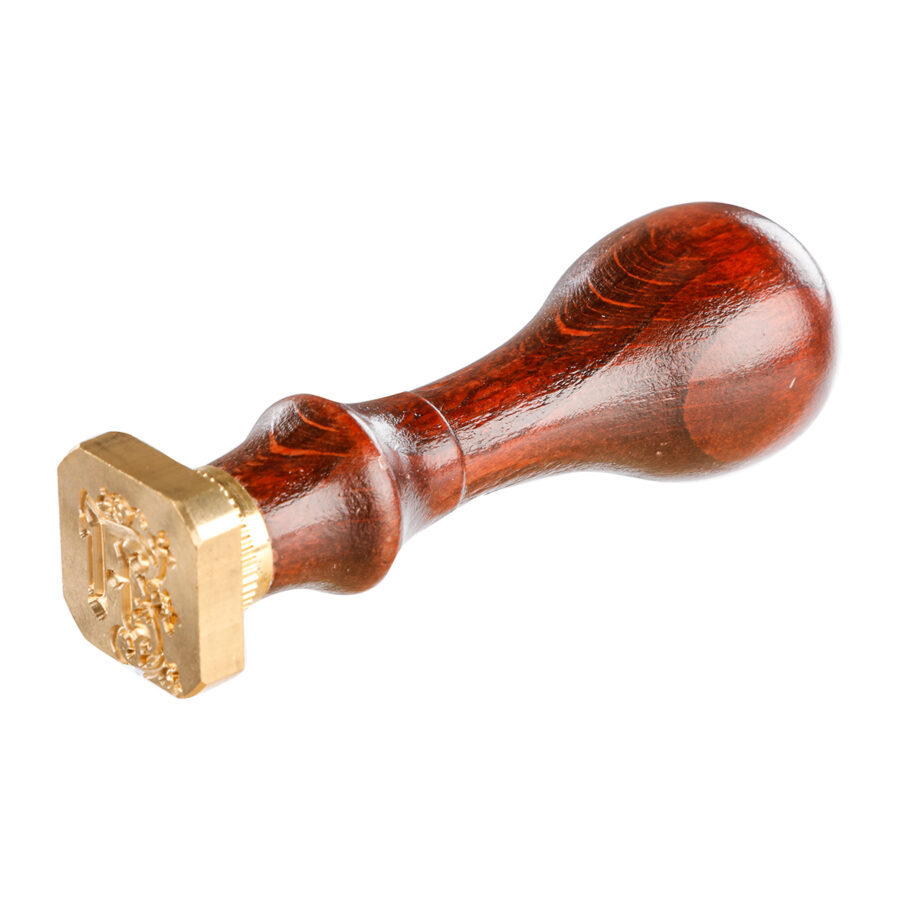 Square seal with varnished wooden handle, illuminated letter A