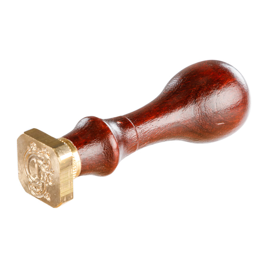 Square seal with varnished wooden handle, illuminated letter D
