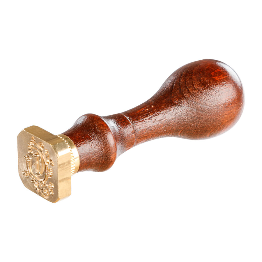 Square seal with varnished wooden handle, illuminated letter G