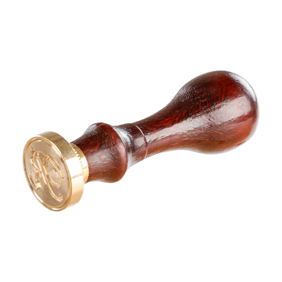 Round seal with varnished wooden handle, letter R in English alphabet
