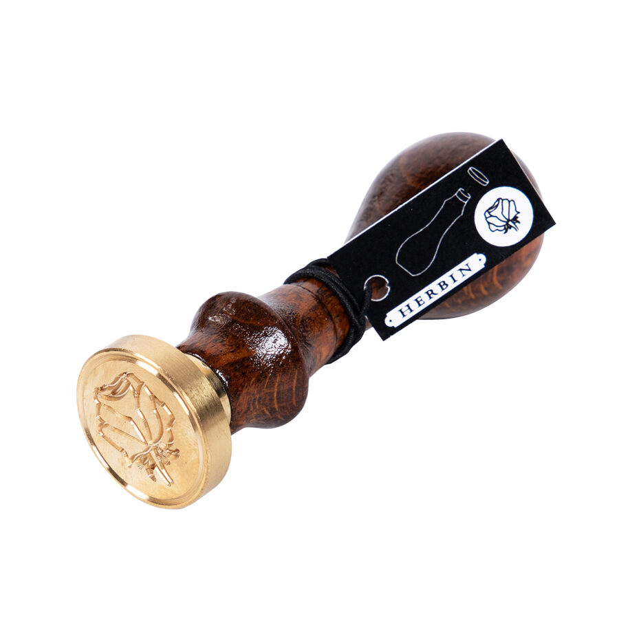 Round seal with varnished wooden handle, Rose symbol